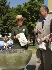 In this photograph taken by AP Images for US Mint, United States Mint Director, Ed Moy, right, and Josie Fernandez, superintendent of Hot Springs National Park, left, joke around next to a table loaded with quarters in the America the Beautiful series honoring Hot Springs National Park, during a Ceremony in Hot Springs, Ark., launching the first coin in the program, Tuesday, April 20, 2010. (Mike Wintroath/ AP Images/ US Mint)